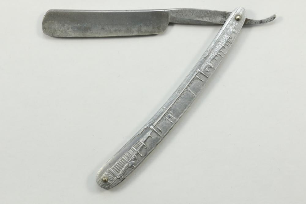 Trapezoidal Razor With Pattern Absolute Auctions & Realty