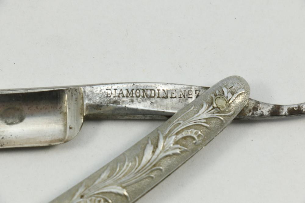 Trapezoidal Razor With Pattern Absolute Auctions & Realty